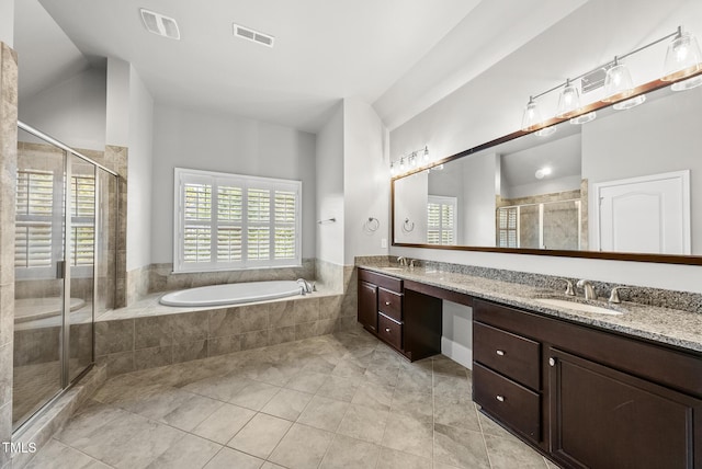 7112 Hasentree Way, Wake Forest, NC 27587 - bathroom featuring double vanity, healthy amount of natural light, a bath, and a stall shower