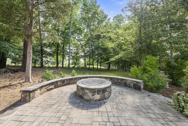 7112 Hasentree Way, Wake Forest, NC 27587 - view of patio with a fire pit