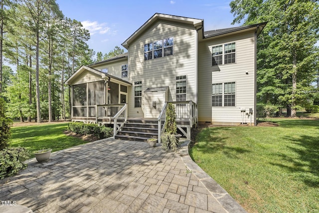 7112 Hasentree Way, Wake Forest, NC 27587 - back of property featuring a sunroom, a patio area, a yard, and a deck