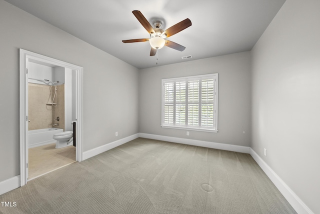 7112 Hasentree Way, Wake Forest, NC 27587 - unfurnished bedroom with carpet floors, ensuite bath, and a ceiling fan