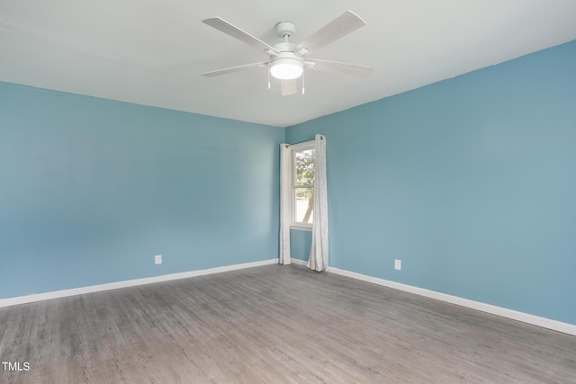 3542 Anderson Valley Rd, Mcleansville, NC 27301 - empty room featuring wood finished floors and a ceiling fan