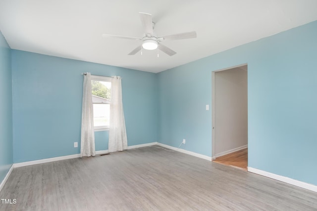 3542 Anderson Valley Rd, Mcleansville, NC 27301 - empty room with wood finished floors and a ceiling fan