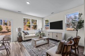 131 N Chubb Rdg, Wilsons Mills, NC 27520 - living room with wood finished floors and healthy amount of natural light