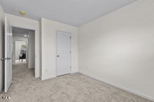 131 N Chubb Rdg, Wilsons Mills, NC 27520 - unfurnished bedroom with carpet floors