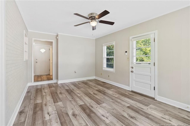 3810 David St, Fayetteville, NC 28304 - foyer entrance featuring wood finished floors, ceiling fan, and ornamental molding