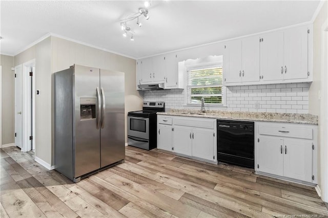 3810 David St, Fayetteville, NC 28304 - kitchen with appliances with stainless steel finishes, ornamental molding, light wood finished floors, and white cabinetry