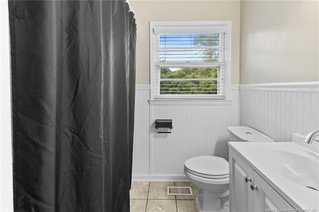 3810 David St, Fayetteville, NC 28304 - full bath with wainscoting, vanity, tile patterned flooring, and a shower with curtain