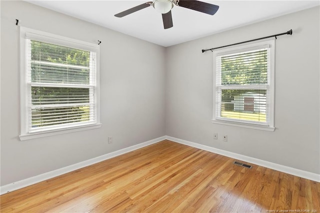 3810 David St, Fayetteville, NC 28304 - unfurnished room featuring plenty of natural light, light wood finished floors, and a ceiling fan