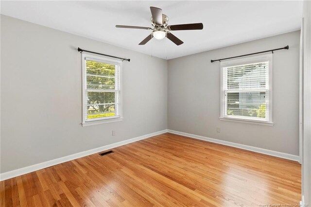 3810 David St, Fayetteville, NC 28304 - empty room featuring light wood-type flooring and a ceiling fan