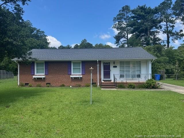 5027 Chesapeake Rd, Fayetteville, NC 28311 - single story home with covered porch, a shingled roof, and brick siding