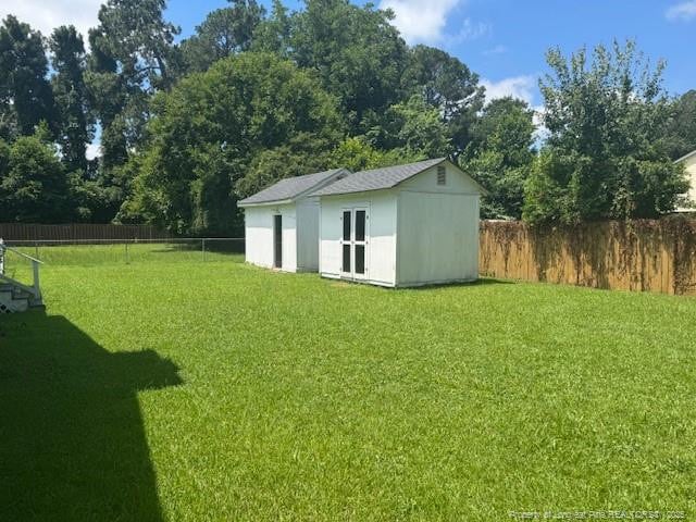 5027 Chesapeake Rd, Fayetteville, NC 28311 - fenced backyard with a shed
