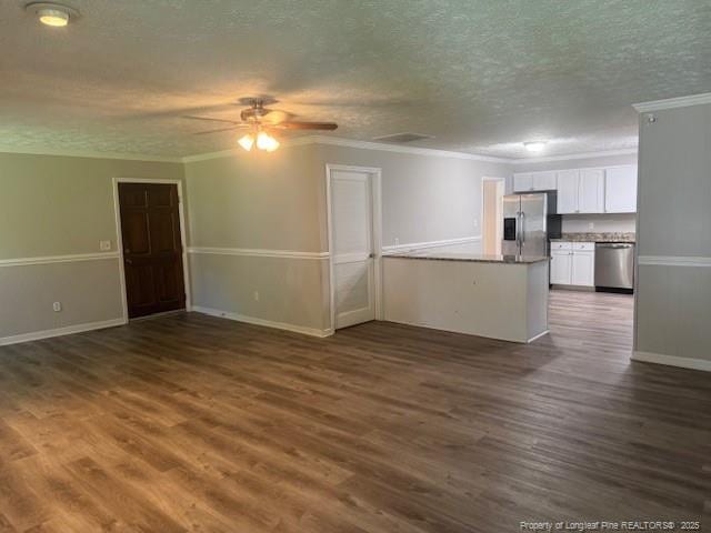 5027 Chesapeake Rd, Fayetteville, NC 28311 - unfurnished living room with dark wood finished floors, a ceiling fan, a textured ceiling, and ornamental molding