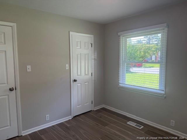 5027 Chesapeake Rd, Fayetteville, NC 28311 - spare room with dark wood finished floors and baseboards