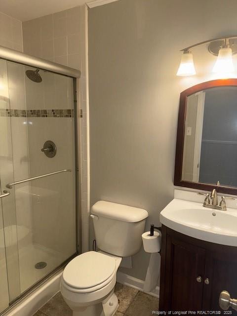 5027 Chesapeake Rd, Fayetteville, NC 28311 - full bath with a shower stall, vanity, and tile patterned flooring