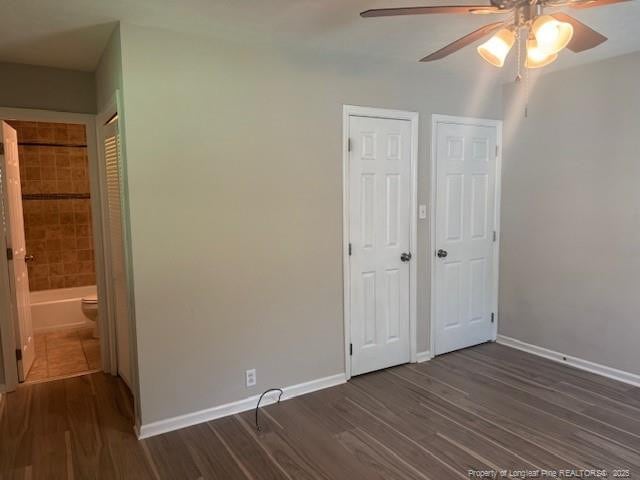 5027 Chesapeake Rd, Fayetteville, NC 28311 - unfurnished bedroom with dark wood finished floors and ceiling fan