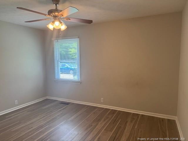 5027 Chesapeake Rd, Fayetteville, NC 28311 - spare room with dark wood finished floors and ceiling fan