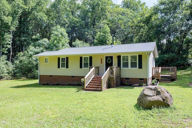 8905 Dukes Lake Rd, Zebulon, NC 27597 - single story home featuring crawl space, a front lawn, roof with shingles, and a deck