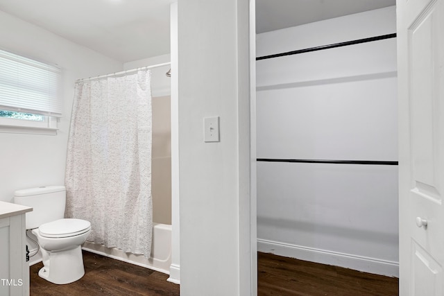 8905 Dukes Lake Rd, Zebulon, NC 27597 - full bathroom with wood finished floors, vanity, and shower / bath combo with shower curtain