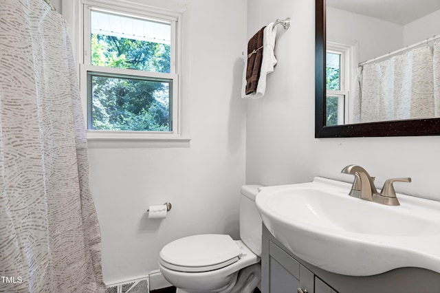 8905 Dukes Lake Rd, Zebulon, NC 27597 - bathroom with vanity and curtained shower