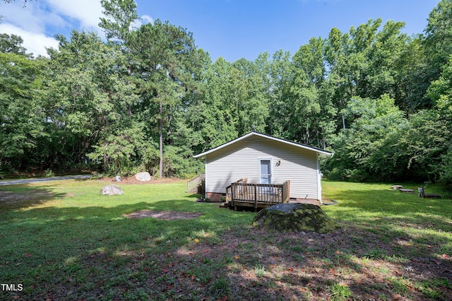 8905 Dukes Lake Rd, Zebulon, NC 27597 - view of grassy yard featuring a wooded view