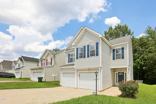1212 Southgate Dr, Raleigh, NC 27610 - view of front of home with an attached garage, concrete driveway, and a front yard