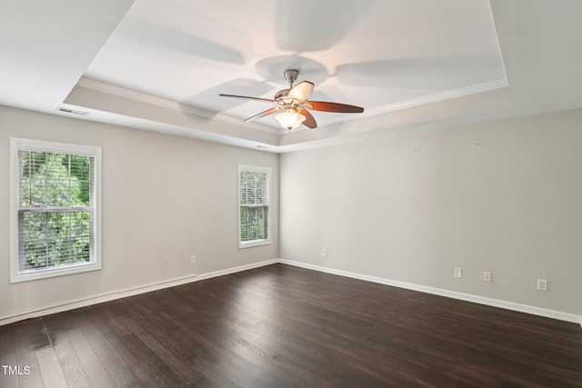1212 Southgate Dr, Raleigh, NC 27610 - unfurnished room with a tray ceiling, wood finished floors, ornamental molding, and ceiling fan