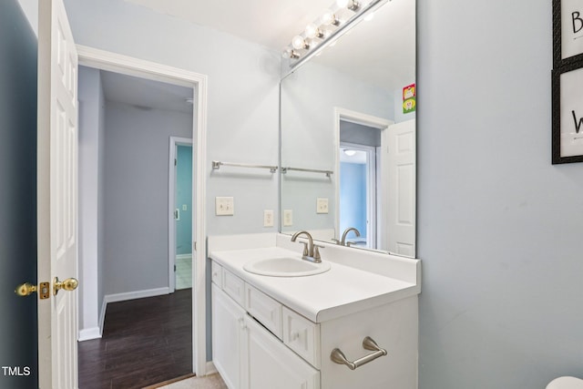 1212 Southgate Dr, Raleigh, NC 27610 - bathroom with vanity and wood finished floors