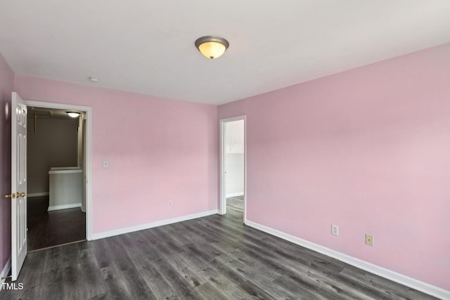 1212 Southgate Dr, Raleigh, NC 27610 - empty room with dark wood-style flooring and baseboards