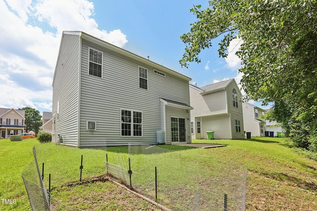 1212 Southgate Dr, Raleigh, NC 27610 - back of property featuring a yard and a garden
