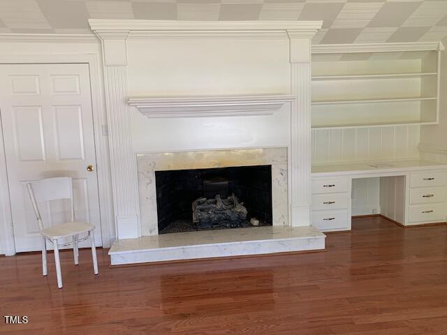 1003 Summerville Mamers Rd, Lillington, NC 27546 - detailed view of crown molding, a fireplace, wood finished floors, and built in shelves