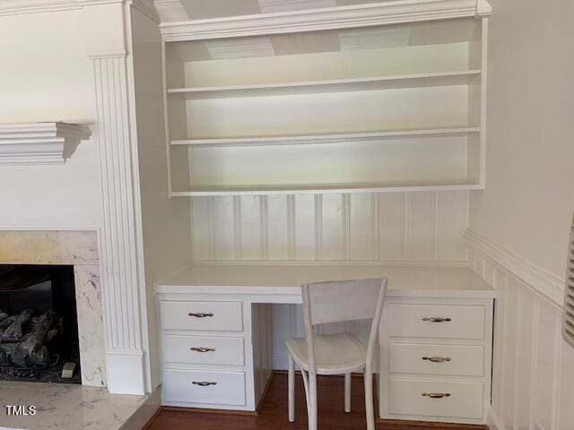 1003 Summerville Mamers Rd, Lillington, NC 27546 - unfurnished office with built in desk, a premium fireplace, and dark wood-style flooring