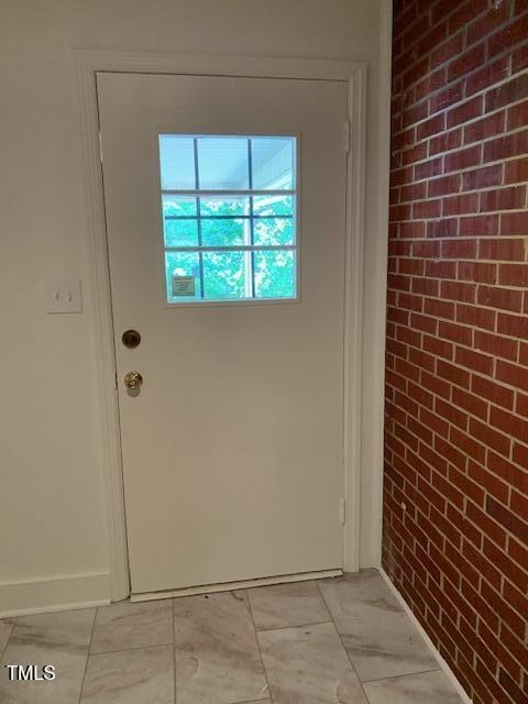 1003 Summerville Mamers Rd, Lillington, NC 27546 - entryway with light marble finish flooring and baseboards