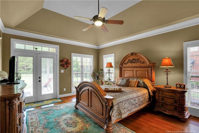 2825 Sand Trap Ln, Hope Mills, NC 28348 - bedroom with access to exterior, a raised ceiling, french doors, wood finished floors, and multiple windows