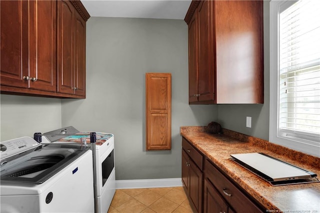2825 Sand Trap Ln, Hope Mills, NC 28348 - laundry room with independent washer and dryer, cabinet space, and light tile patterned floors