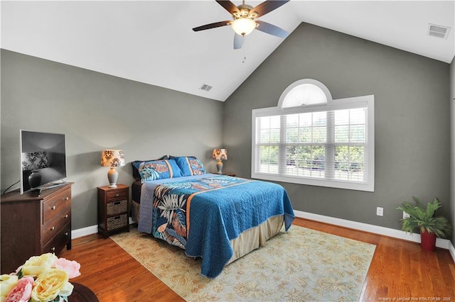 2825 Sand Trap Ln, Hope Mills, NC 28348 - bedroom featuring vaulted ceiling, wood finished floors, and a ceiling fan