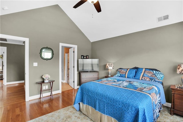 2825 Sand Trap Ln, Hope Mills, NC 28348 - bedroom featuring wood finished floors, high vaulted ceiling, and a ceiling fan