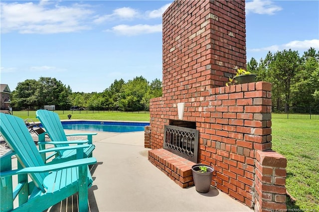 2825 Sand Trap Ln, Hope Mills, NC 28348 - view of swimming pool featuring a patio area and an outdoor brick fireplace