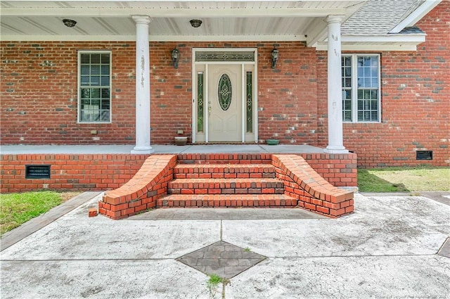 1190 Mckeller Rd, Fairmont, NC 28340 - entrance to property featuring covered porch, crawl space, and brick siding