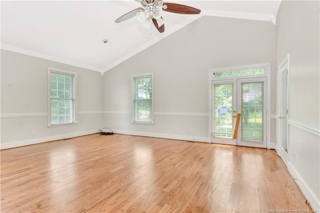 1190 Mckeller Rd, Fairmont, NC 28340 - empty room with ceiling fan, healthy amount of natural light, wood finished floors, high vaulted ceiling, and crown molding