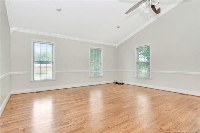 1190 Mckeller Rd, Fairmont, NC 28340 - spare room featuring vaulted ceiling, a ceiling fan, light wood finished floors, and ornamental molding