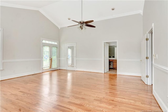 1190 Mckeller Rd, Fairmont, NC 28340 - unfurnished living room featuring ceiling fan, high vaulted ceiling, crown molding, and light wood-style floors