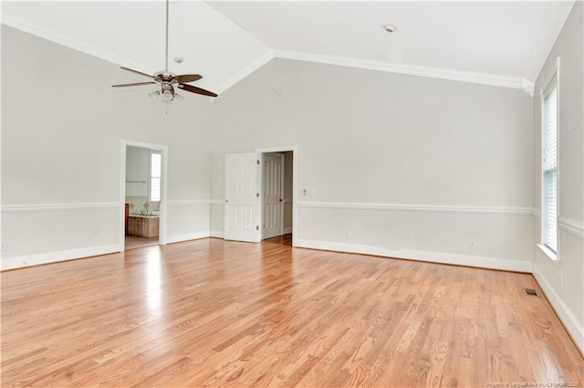 1190 Mckeller Rd, Fairmont, NC 28340 - empty room with healthy amount of natural light, ceiling fan, crown molding, vaulted ceiling, and light wood-style flooring