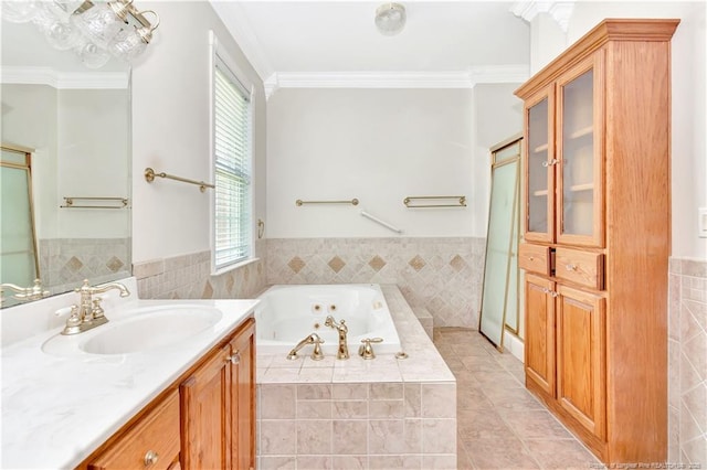 1190 Mckeller Rd, Fairmont, NC 28340 - full bath with vanity, ornamental molding, a jetted tub, tile patterned floors, and healthy amount of natural light