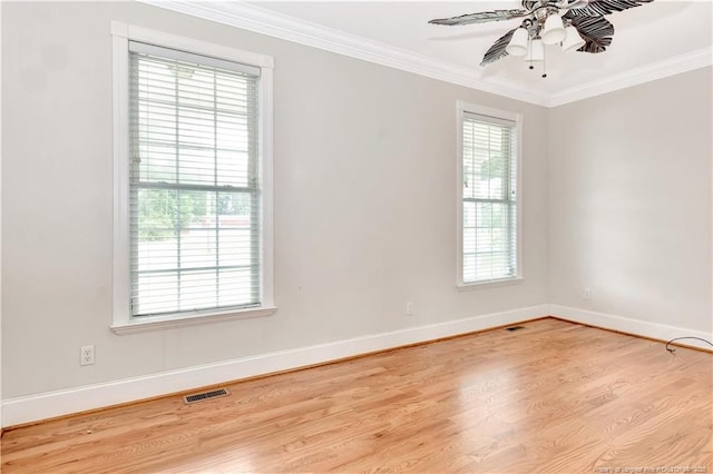 1190 Mckeller Rd, Fairmont, NC 28340 - spare room featuring a ceiling fan, crown molding, and wood finished floors