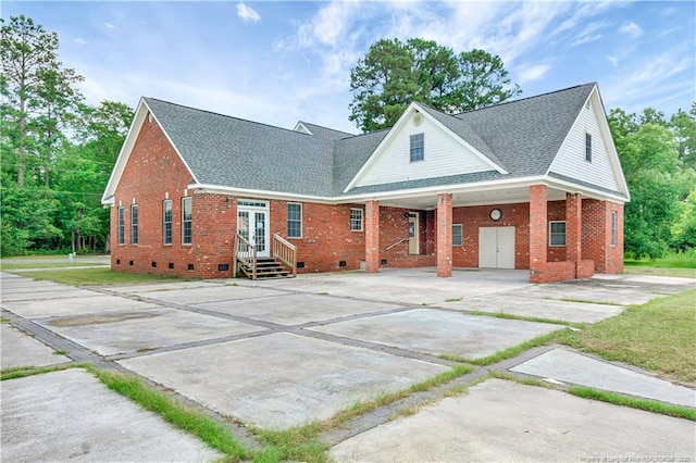 1190 Mckeller Rd, Fairmont, NC 28340 - view of front of house featuring crawl space, concrete driveway, brick siding, and roof with shingles