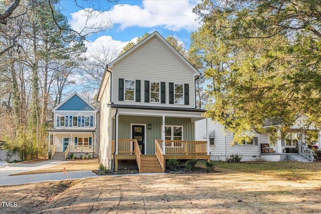 1917 Essex Unit B, Durham, NC 27704 - view of front of property with covered porch and crawl space