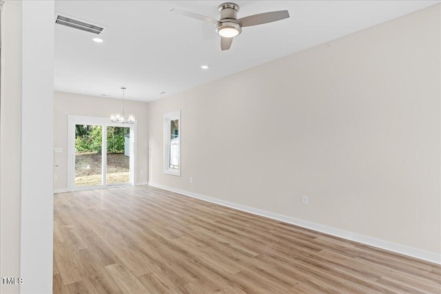 1917 Essex Unit B, Durham, NC 27704 - empty room with a chandelier, light wood-style floors, a ceiling fan, and recessed lighting