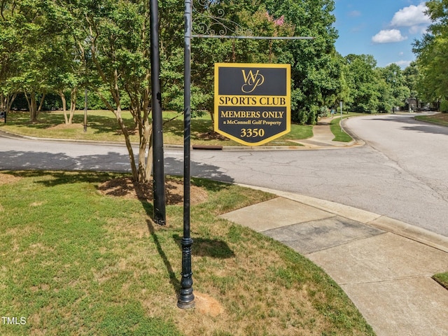 12510 Megan Hill Ct, Raleigh, NC 27614 - community sign featuring a lawn