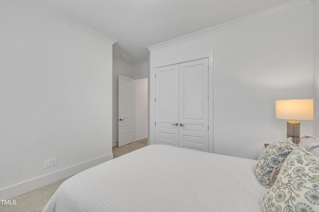 2203 Meadowcreek Dr, Durham, NC 27705 - carpeted bedroom with crown molding and a closet