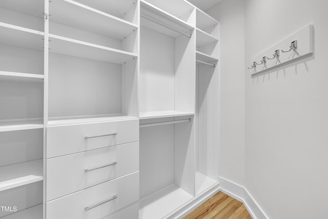 2203 Meadowcreek Dr, Durham, NC 27705 - walk in closet featuring light wood-style flooring